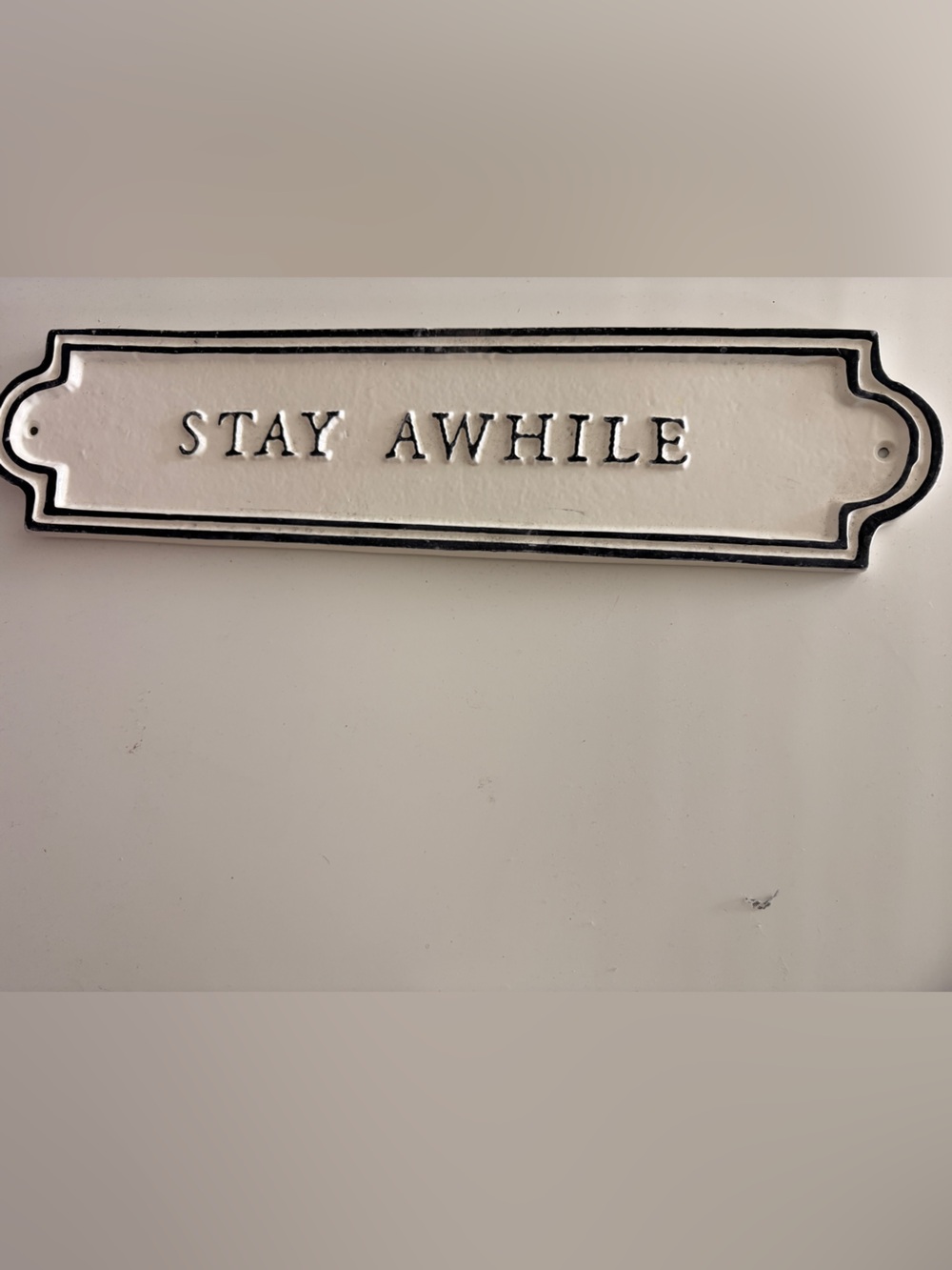 Hearth and Hand Stay Awhile sign